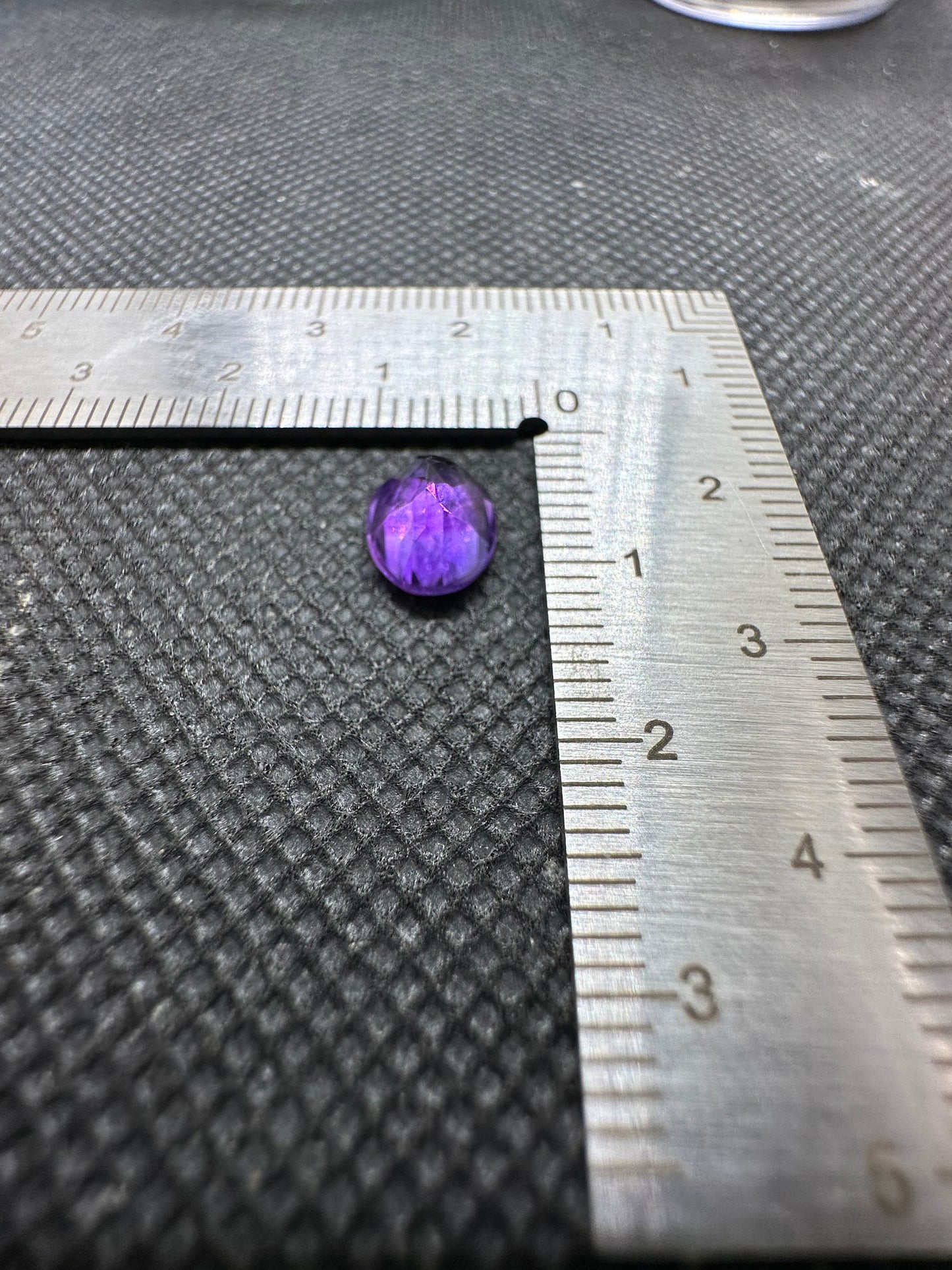 Faceted, purple amethyst 
