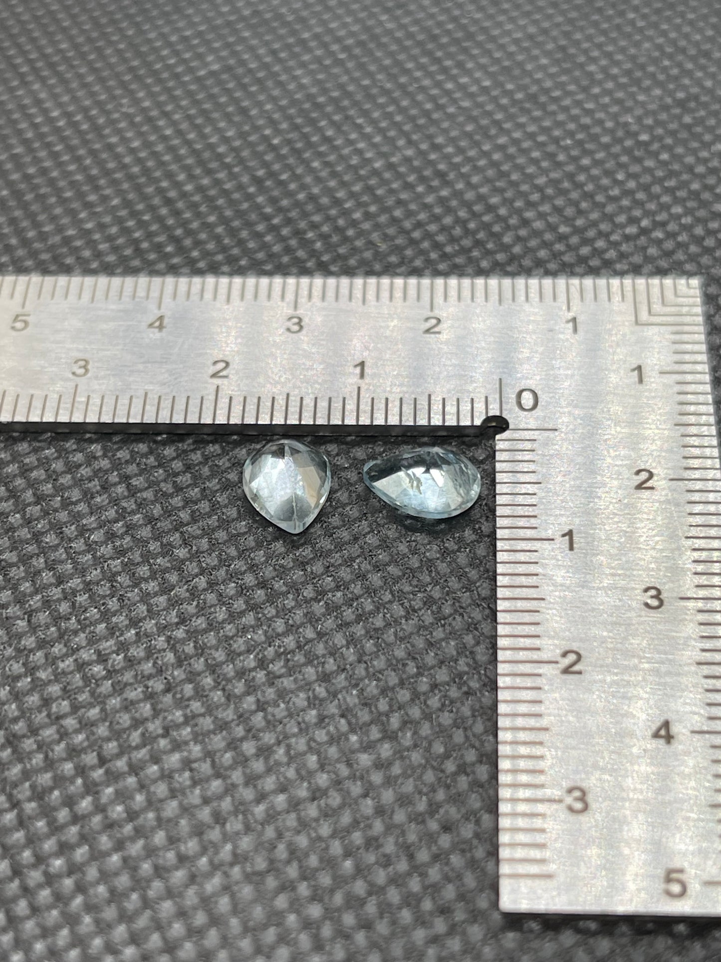 Pear cut faceted, Blue Sky Topaz 