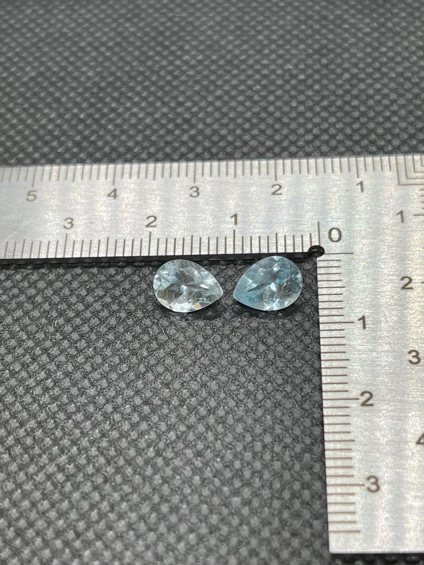 Pear cut faceted, Blue Sky Topaz 