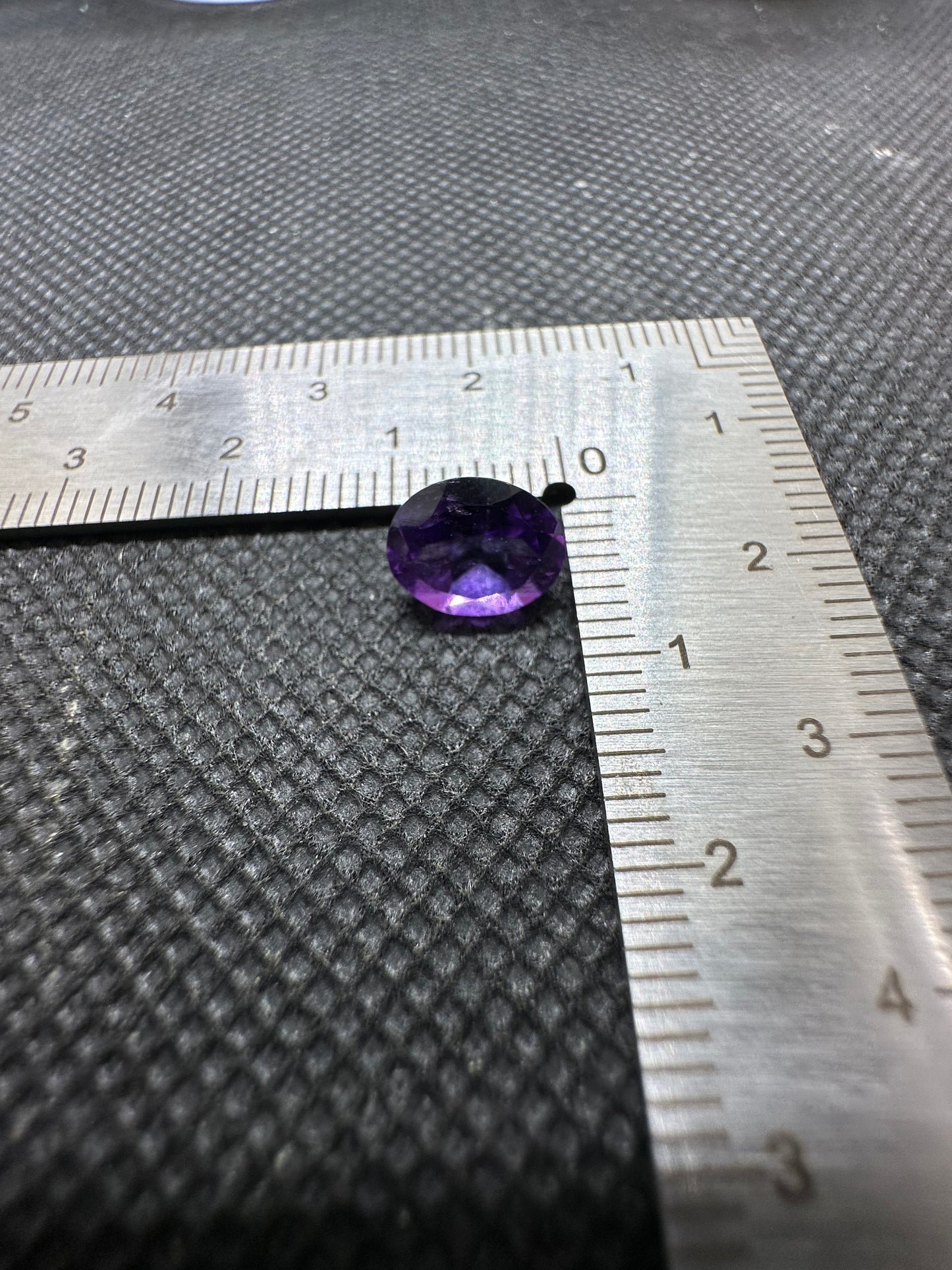 Faceted, purple amethyst 